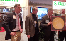 John Siegenthaler (center) receiving the Carson-Holohan Industry Award at AHR 2014.