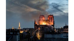 Flames and smoke are seen billowing from the roof at Notre-Dame Cathedral on April 15, 2019 in Paris, France. Flames and smoke are seen billowing from the roof at Notre-Dame Cathedral on April 15, 2019 in Paris, France.