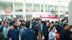 Attendees to ISH China &amp; CIHE at the doors of the New China International Exhibition Center.