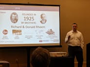 Brian White shows a slide giving an overview of Rheem&apos;s company history during his and Chris Day&apos;s session at PHCC Connect 2019.