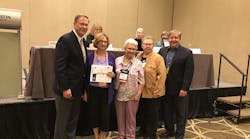 Rob Grim and Joe Maiale of InSinkErator present the First Place service proejct award to Gail McWilliams, Becky Davis and Bev Potts of the Illinois PHCC Auxiliary.