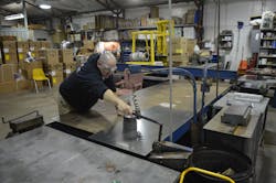 A technician works in the Smith-Dahlquist prefab shop. A technician works in the Smith-Dahlquist prefab shop.