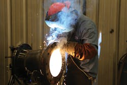 A TD partner performs specialized, precision welding in the company’s prefabrication facility. A TD partner performs specialized, precision welding in the company’s prefabrication facility.
