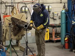 An E.M. Duggan employee working in one of the company’s prefab shops. An E.M. Duggan employee working in one of the company’s prefab shops.