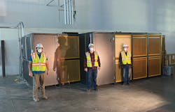 McKinstry technicians wearing facemasks and practicing social distancing at a job site. McKinstry technicians wearing facemasks and practicing social distancing at a job site.