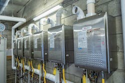 Multiple condensing tankless heaters improved the resiliency and reliability of the correctional facility&rsquo;s hot water supply system.