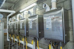 Multiple condensing tankless heaters improved the resiliency and reliability of the correctional facility’s hot water supply system. Multiple condensing tankless heaters improved the resiliency and reliability of the correctional facility’s hot water supply system.