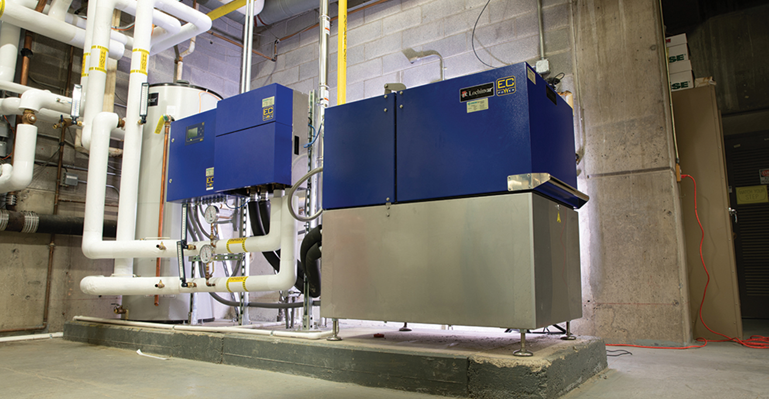 Lochinvar&rsquo;s XRGI 25 cogeneration system &mdash; installed here at Finger Lakes Community College &mdash; produces 24 kilowatts of electricity and 163,000 Btu of heat. The micro CHP system is tied to two Knight boilers and hot water storage tanks.
