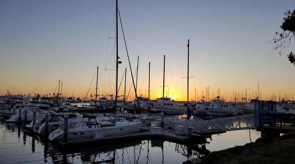 Sailboats Tethered at the Marina Dock at Mission Bay in San Diego California.