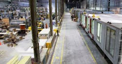Crews at FullStack Modular’s 100,000-sq-ft factory in the Brooklyn Navy Yard make sure all components fit before they are shipped. Crews at FullStack Modular’s 100,000-sq-ft factory in the Brooklyn Navy Yard make sure all components fit before they are shipped.