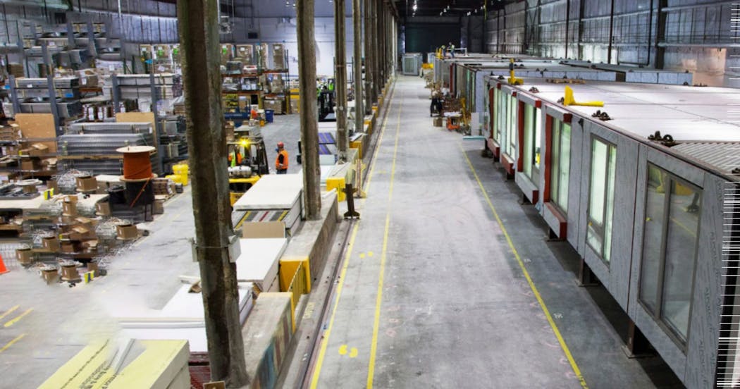 Crews at FullStack Modular&rsquo;s 100,000-sq-ft factory in the Brooklyn Navy Yard make sure all components fit before they are shipped.