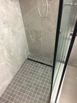 The Hospitality Innovations crew installed 225 walk-in showers with linear drainage systems in the Houston Marriott Medical Center Hotel at about 10 per day.