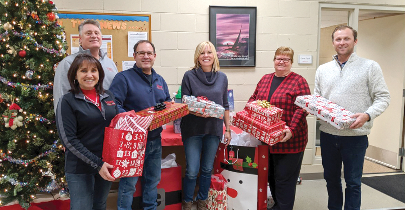 Christmas gifts from Erickson getting ready to go to the Sertoma Centre organization.