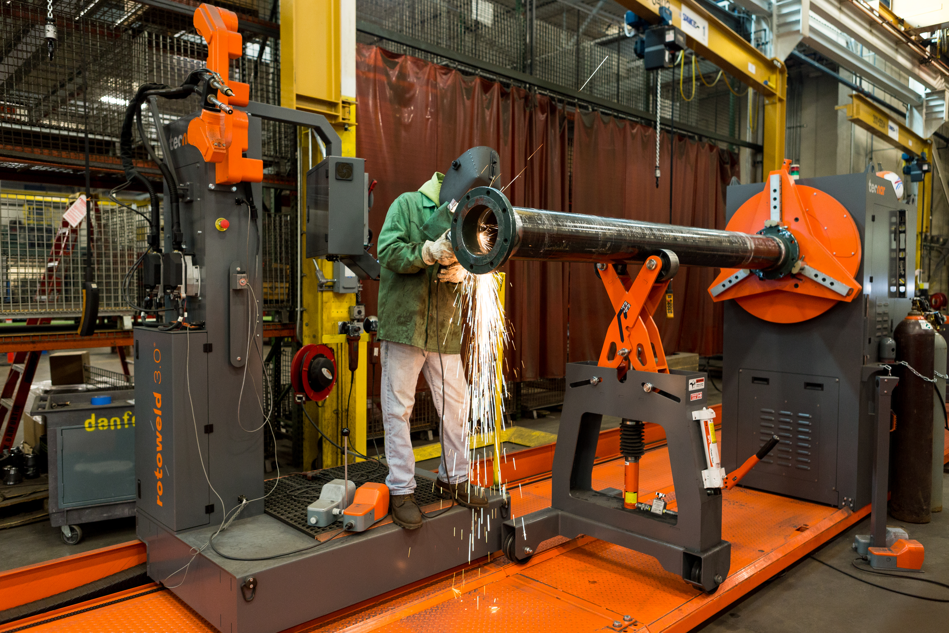 Work continues in John W. Danforth's pipe fabrication facility.