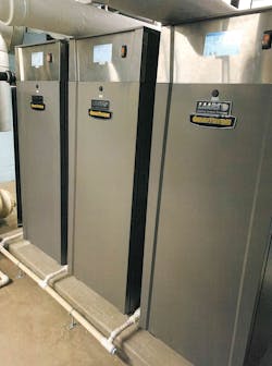 A view of the three new OmniTherm units in the school's mechanical room. A view of the three new OmniTherm units in the school's mechanical room.