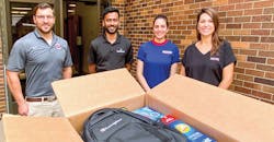 Ridgid employees at the school supply drive. Ridgid employees at the school supply drive.