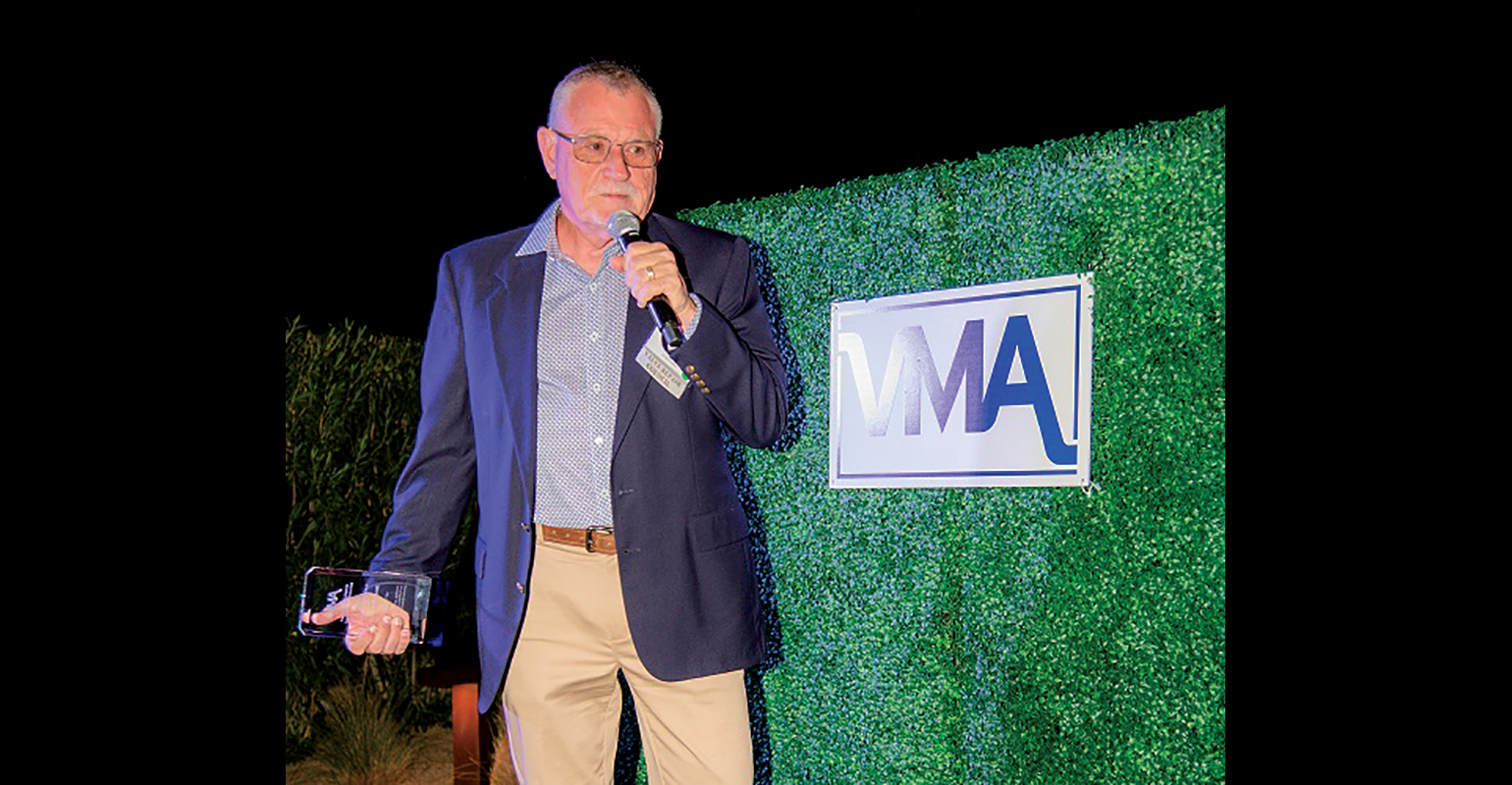 Greg Johnson, President at United Valve, speaks after receiving the Person of the Year Award.