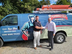 Matt Hord, Owner of The Plumbing &amp; Air Service Company, shakes hands with Jarrod Brinker, Vice President of Acquisitions at Southern HVAC.