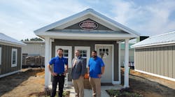 Nick Grady (left), fabrication product manager at A. O. Smith, Bryan Braddock (center), executive director at House of Hope and Denis Davis (right), communications director at House of Hope.