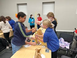Contestants use spaghetti and plumber's putty during the tower-building competition. Contestants use spaghetti and plumber's putty during the tower-building competition.