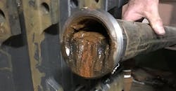 As you can see, this pipe is 75% full of sludge. The restriction slows the flow of water back to the boiler. As you can see, this pipe is 75% full of sludge. The restriction slows the flow of water back to the boiler.