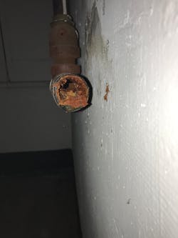 Photo 2 — The end of the wet return that is farthest away. Photo 2 — The end of the wet return that is farthest away.