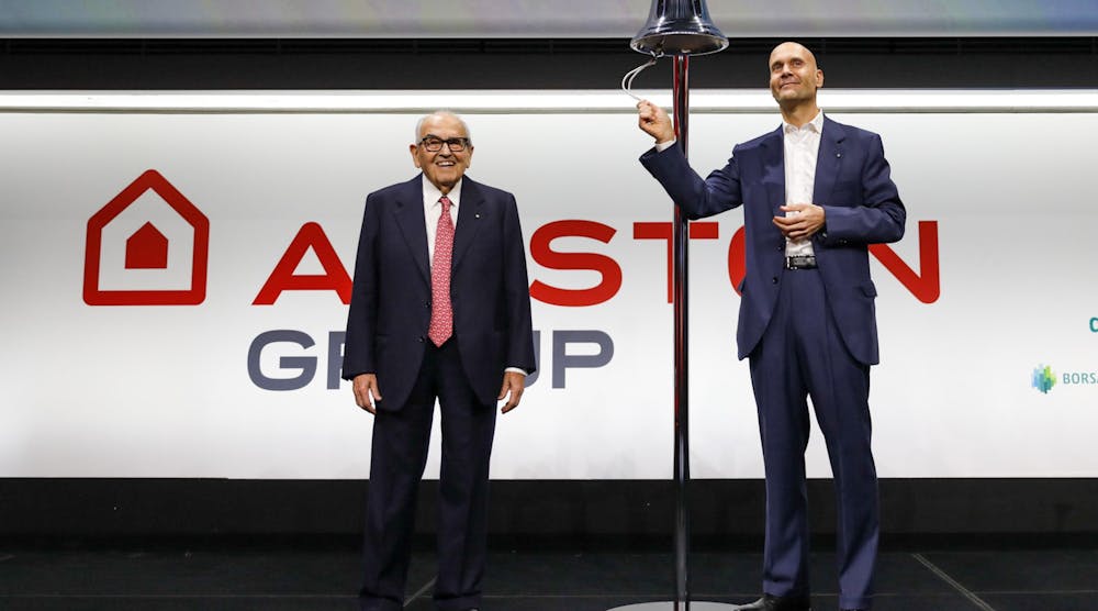 Ariston Group Executive Chairman and former Minister of Executive Chairman, Paolo Merloni (right). ring the bell as it announced it launched an initial public offering.