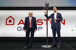 Ariston Group Executive Chairman and former Minister of Executive Chairman, Paolo Merloni (right). ring the bell as it announced it launched an initial public offering. Ariston Group Executive Chairman and former Minister of Executive Chairman, Paolo Merloni (right). ring the bell as it announced it launched an initial public offering.