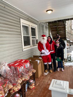 The Pasquale family with some of their holiday donations. The Pasquale family with some of their holiday donations.