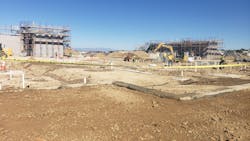 Centennial High School Construction Site | Fall 2021: Early stages of building at the site in Pueblo, Colorado. White pipe is PVC for the school’s underground sanitary system. In the background, block walls for different sections of the school are being erected. The two-story, 185,000-square-foot building broke ground in the spring of 2021 and is slated for completion in 2023. Centennial High School Construction Site | Fall 2021: Early stages of building at the site in Pueblo, Colorado. White pipe is PVC for the school’s underground sanitary system. In the background, block walls for different sections of the school are being erected. The two-story, 185,000-square-foot building broke ground in the spring of 2021 and is slated for completion in 2023.