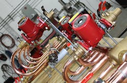Circulators in a hydronic heating panel ready to ship to the job site.