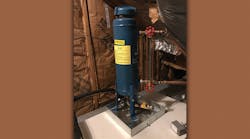 A chemical shot feeder expansion tank. A chemical shot feeder expansion tank.