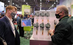 Steve Spaulding and John Barba talk circulators at the Taco booth during AHR Expo 2022. Steve Spaulding and John Barba talk circulators at the Taco booth during AHR Expo 2022.