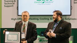 John Hazen White III presents the Dan Holohan Award to Bob Barbour at AHR Expo 2022 in Las Vegas. John Hazen White III presents the Dan Holohan Award to Bob Barbour at AHR Expo 2022 in Las Vegas.