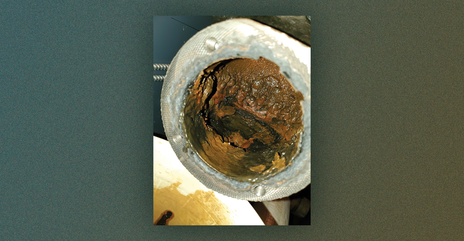 Muck build up inside a float chamber.