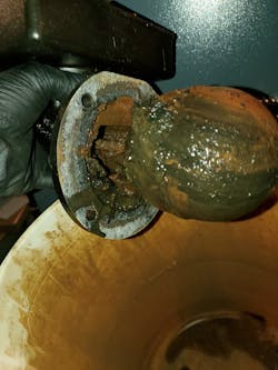 Photo #2 -- muck build up on the float. Photo #2 -- muck build up on the float.