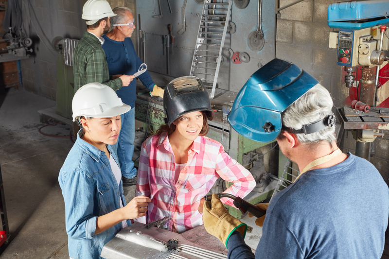 Collage of diverse skilled trades workers including women and minorities in manufacturing