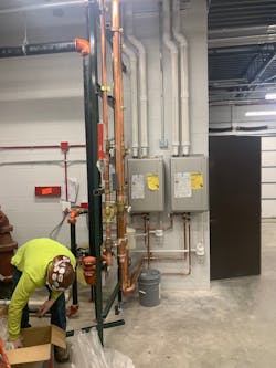 And Erickson technician finishing up an installation. And Erickson technician finishing up an installation.