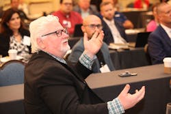 CONTRACTOR&apos;s Editor-at-Large John Mesenbrink asks a question during a presentation.
