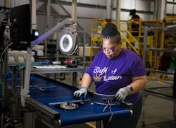 One of the 140 employees at G. E. Appliances' new Camden, SC facility. One of the 140 employees at G. E. Appliances' new Camden, SC facility.