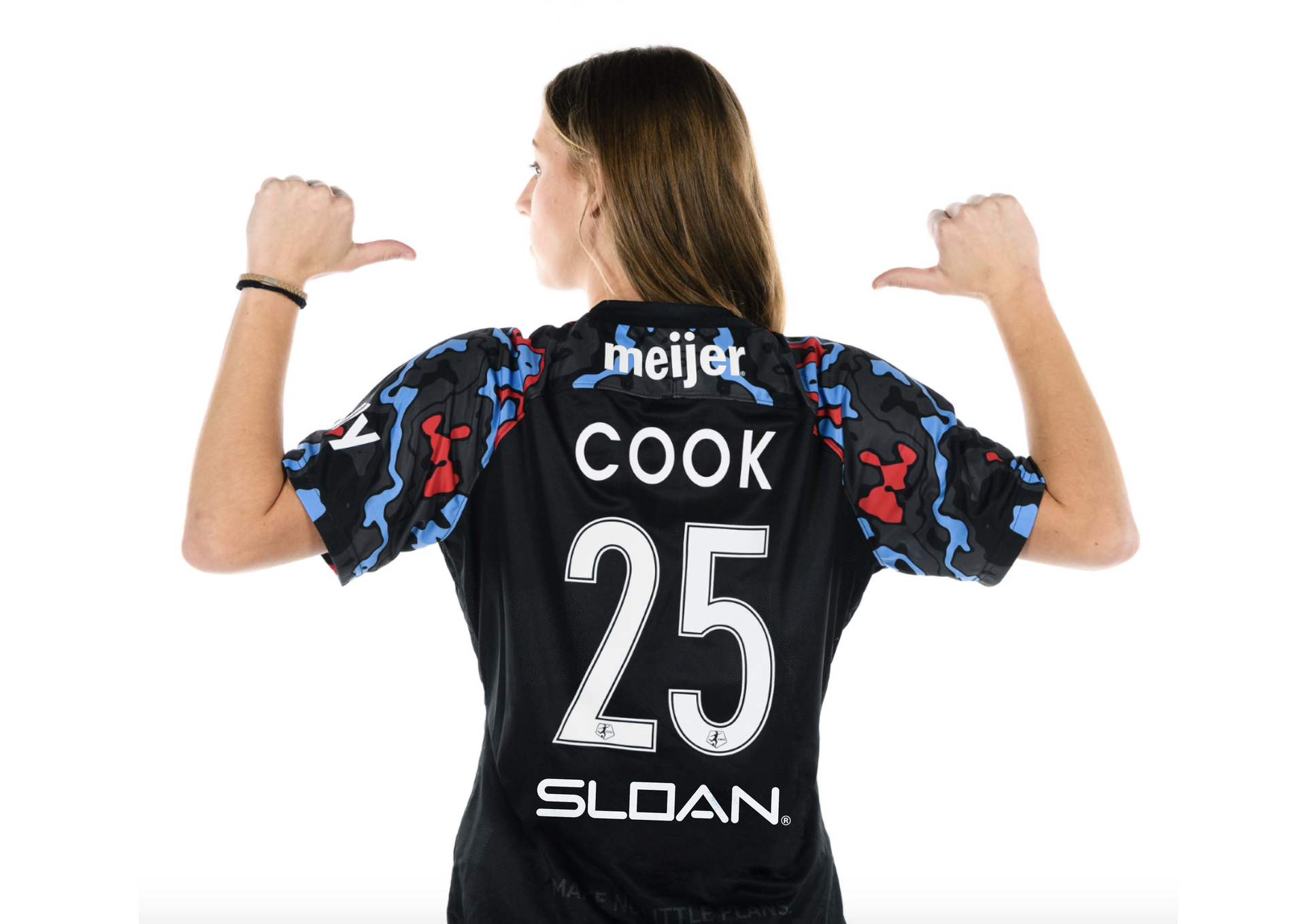 A Red Star jersey with Sloan branding.