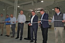 Michael Rauterkus, president and CEO, Uponor Group, (center) joins business leaders as he cuts the ceremonial PEX-a pipe to mark the opening of the company’s $5.5 million, 25,000 sq. ft. expansion in Hutchinson, Minn. Michael Rauterkus, president and CEO, Uponor Group, (center) joins business leaders as he cuts the ceremonial PEX-a pipe to mark the opening of the company’s $5.5 million, 25,000 sq. ft. expansion in Hutchinson, Minn.