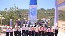 Xylem and Planet Water deliver water tower to Vietnam community.