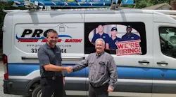 Jarrod Brinker, Chief Strategy Officer at Southern HVAC, shakes hands with Thad Hedrick, President & Founder of Pro Plumbing Services, LLC.