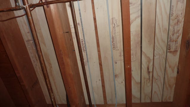 Uponor QuikTrak Aluminum/Plywood Panels, with 5/16&apos; Oxygen Barrier Pex Tubing.