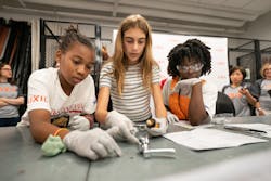 Girls participating in the Tools & Tiaras workshop in NYC. Girls participating in the Tools & Tiaras workshop in NYC.