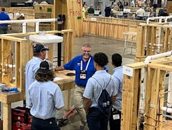 PHCC member and SkillsUSA judge Larry Shoemaker from Deluxe Plumbing and Heating in Bethlehem, PA talks with contestants. PHCC member and SkillsUSA judge Larry Shoemaker from Deluxe Plumbing and Heating in Bethlehem, PA talks with contestants.