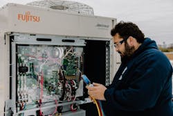 Pattman HVAC installer Yogi Taouch verifies refrigerant pressure characteristics on a VRF Airstage product. Pattman HVAC installer Yogi Taouch verifies refrigerant pressure characteristics on a VRF Airstage product.