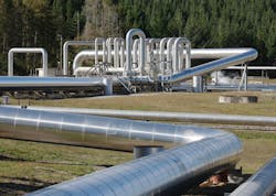 Insulated steam pipework at a geothermal power station. Insulated steam pipework at a geothermal power station.
