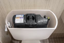 A view inside a pressure-assisted toilet tank. A view inside a pressure-assisted toilet tank.